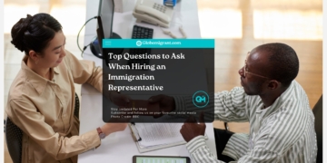 Woman Giving Passport to Bank Manager